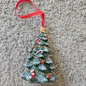Festive Green Christmas Tree Ornament with Red Accents